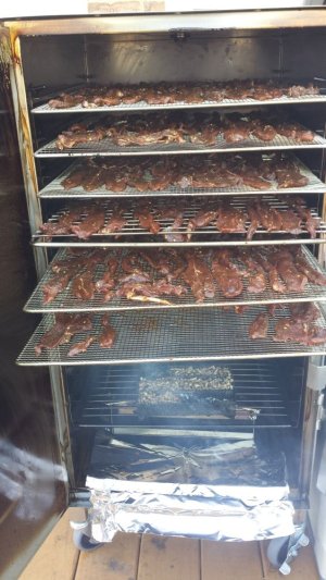 jerky in smoker.jpg